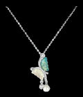 Butterfly pendant necklace with pearls on a white background