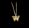 Butterfly-shaped pendant on a gold chain in a box